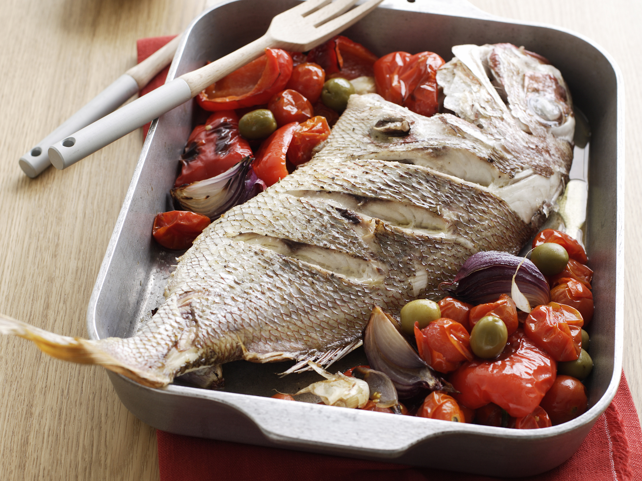 Snapper with roasted tomatoes, capsicums and olives