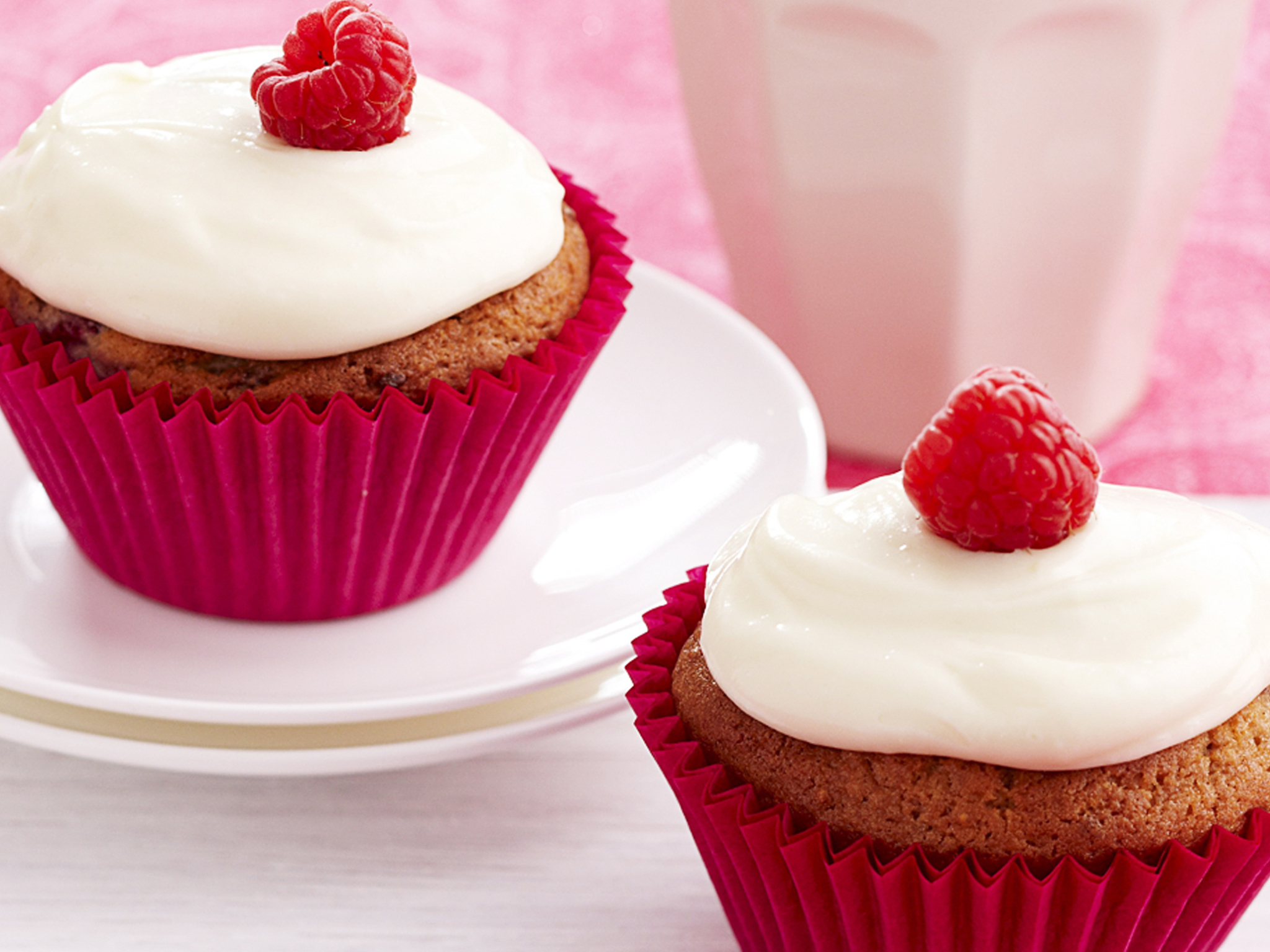 Lemon and raspberry cupcakes with cream cheese frosting