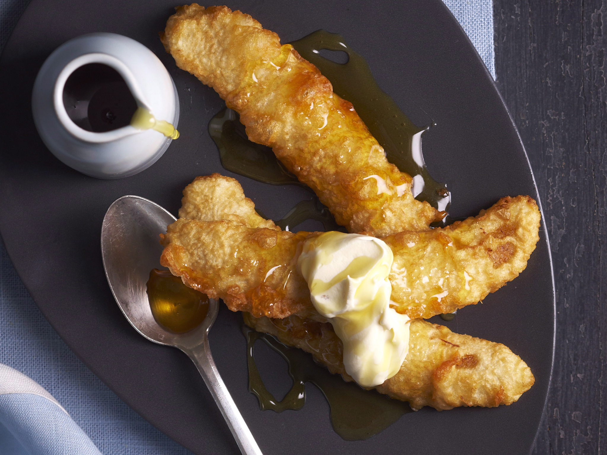 Banana fritters with golden syrup