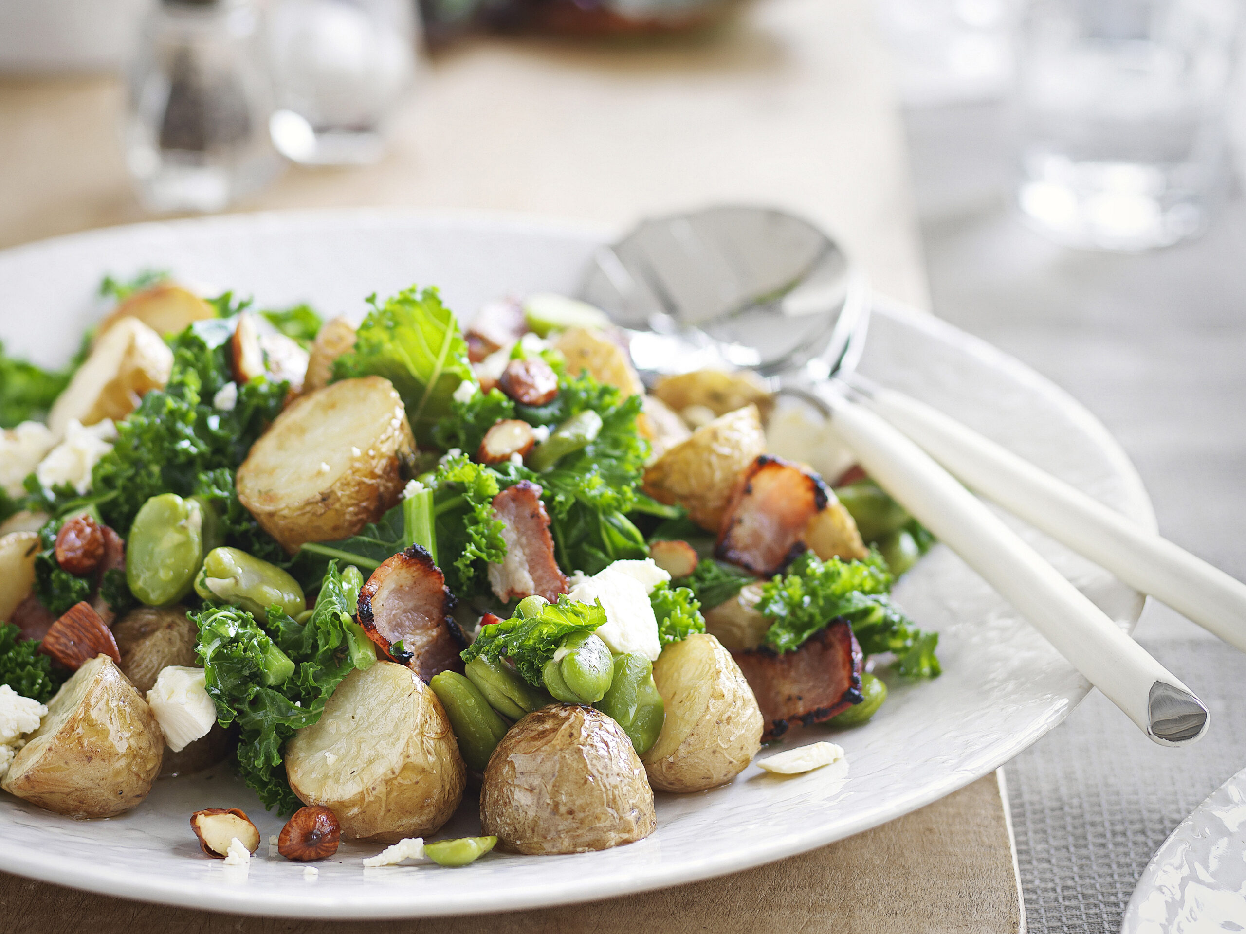 Warm potato and broad bean salad with bacon and feta