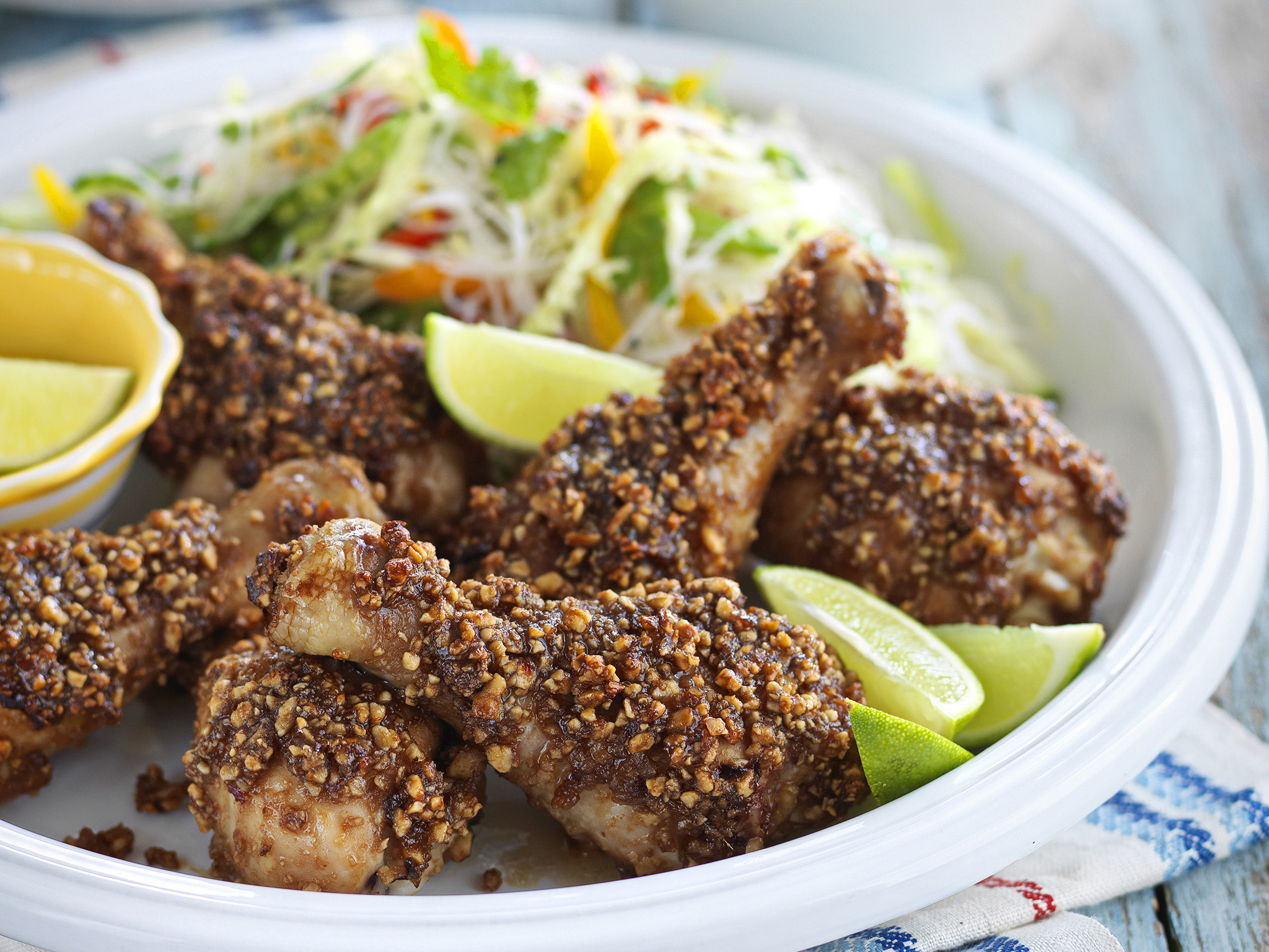 Chicken satay drumsticks with noodle salad