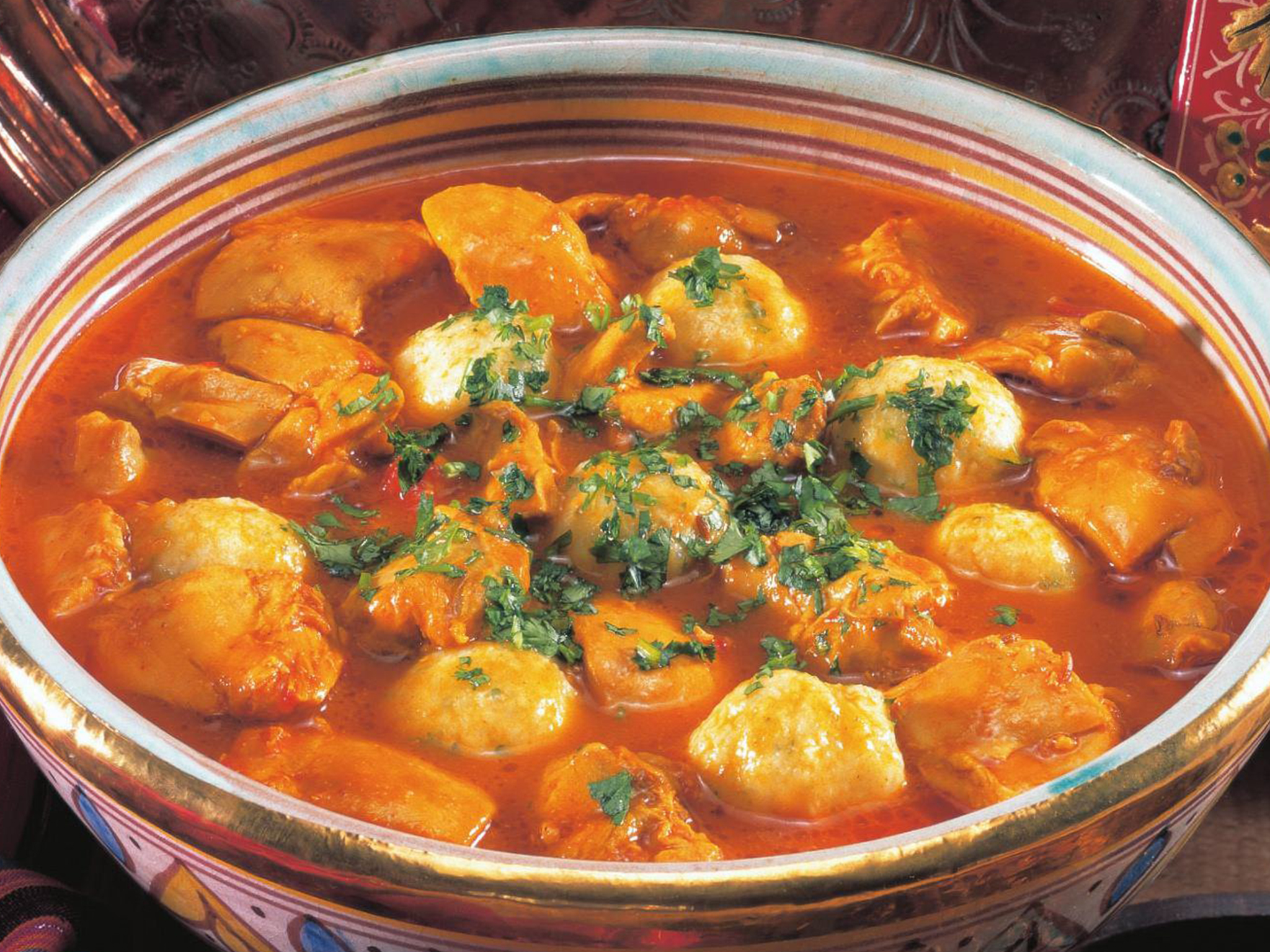 indian-style curry with rice dumplings
