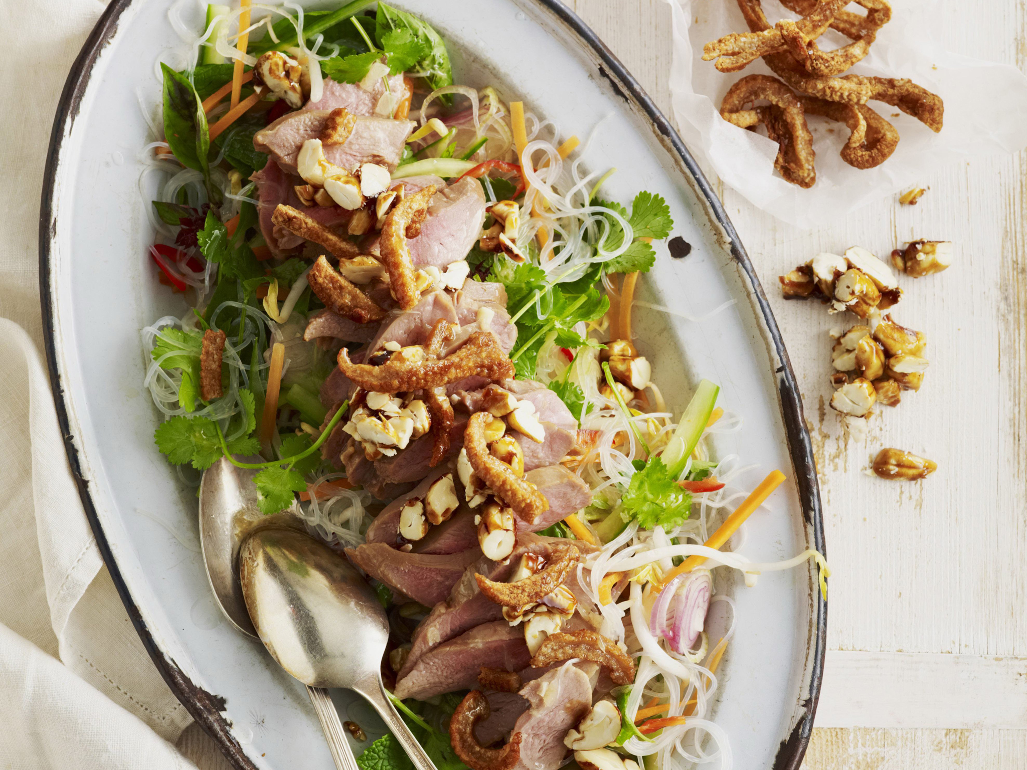 POACHED DUCK AND CASHEW SALAD WITH DUCK CRACKLING