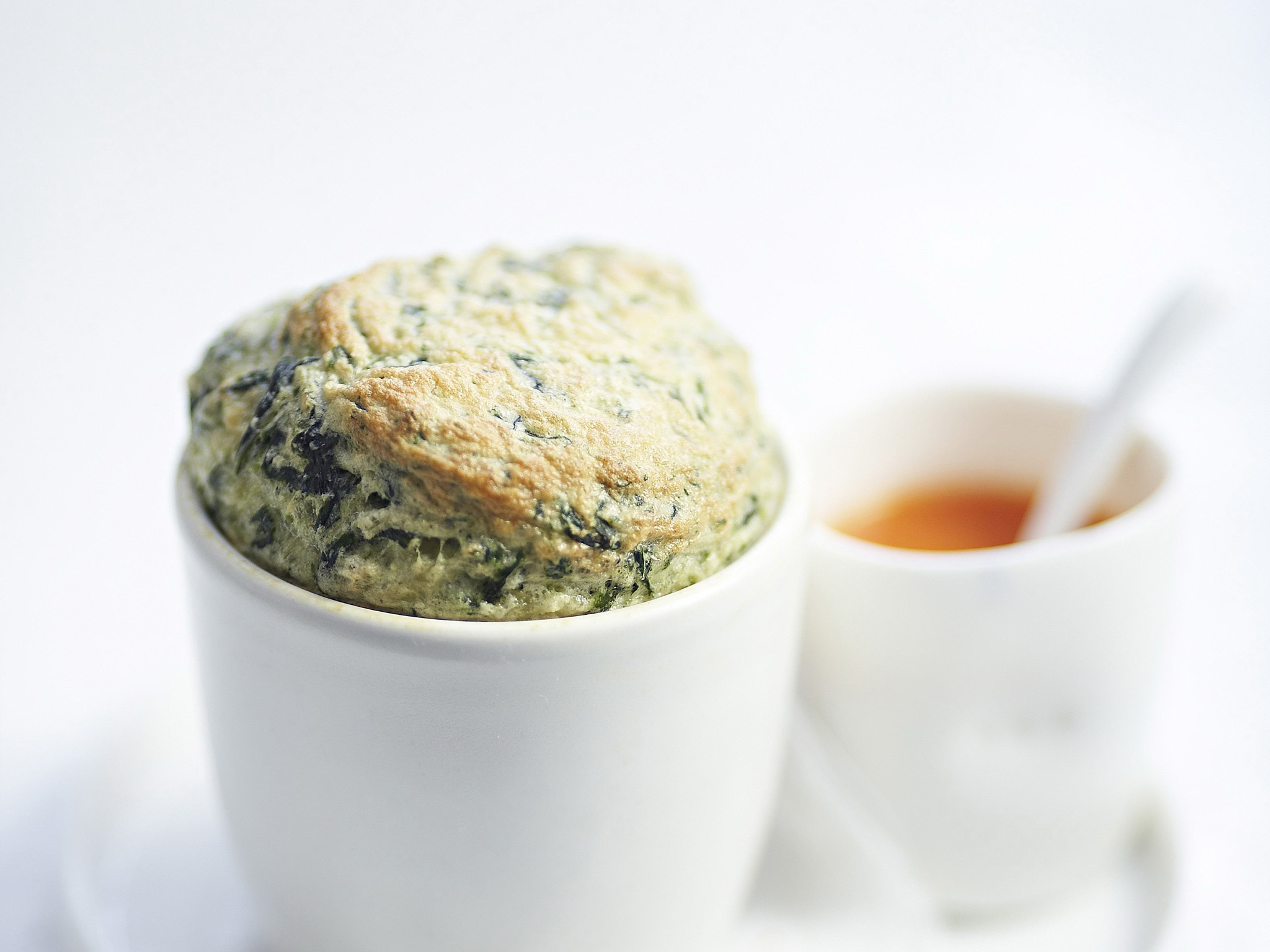 Spinach soufflé with fresh tomato sauce Women's Weekly Food