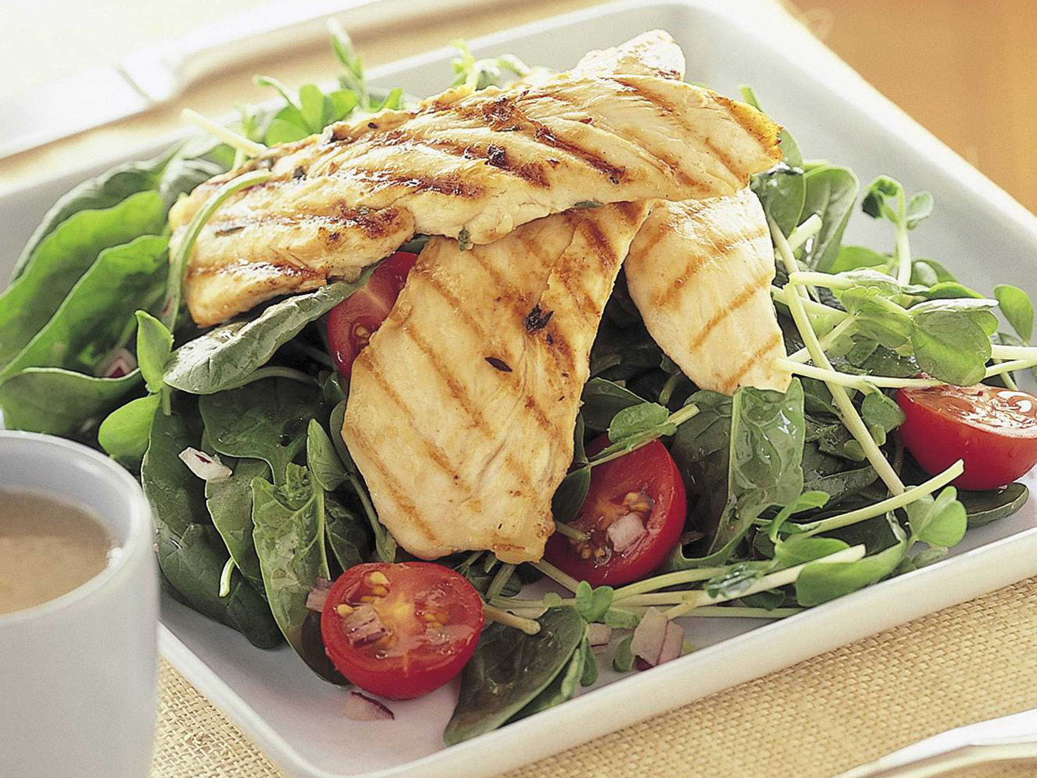 Lemon chicken with baby spinach salad