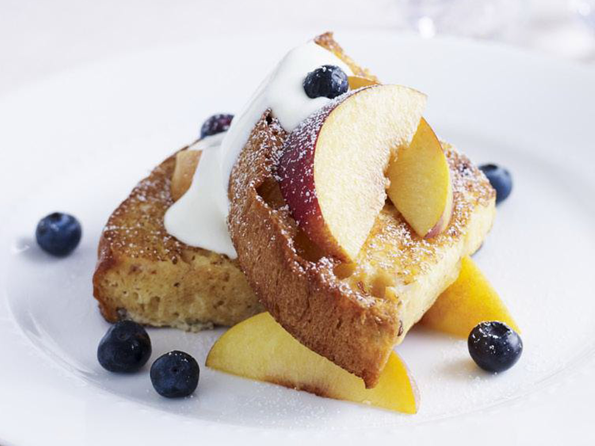 panettone toast with peaches and blueberries