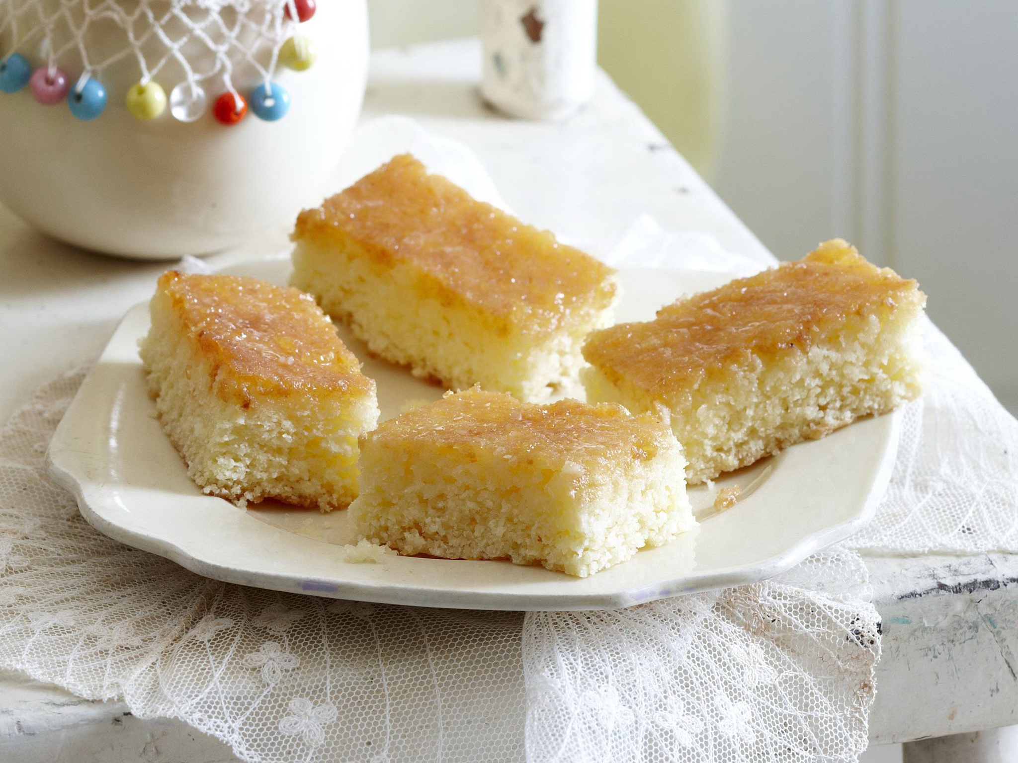 coconut slice with lemon syrup