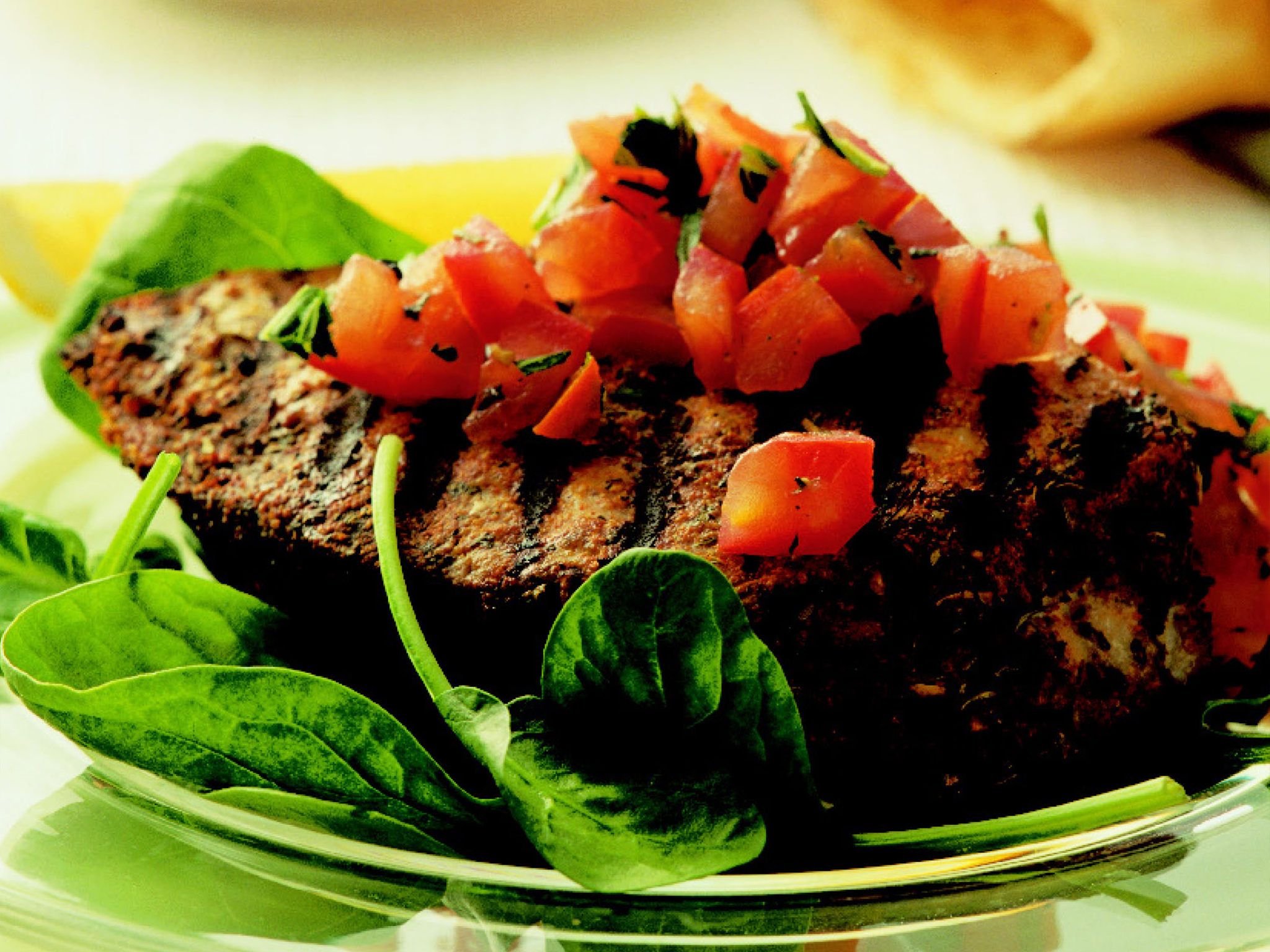 seasoned tuna steaks with tomato salad