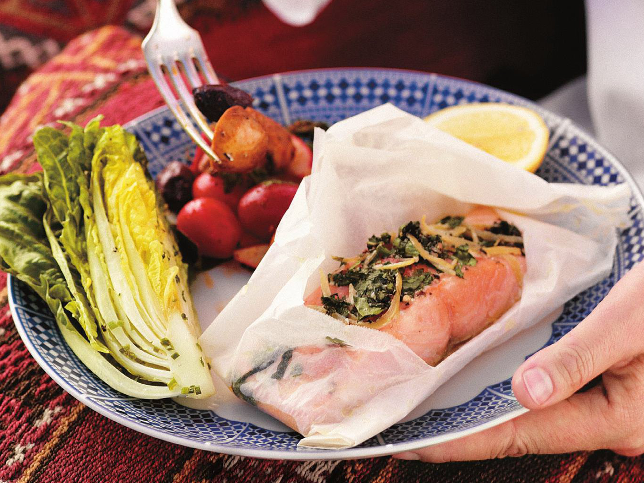 Salmon baked in paper with preserved lemon and herbs