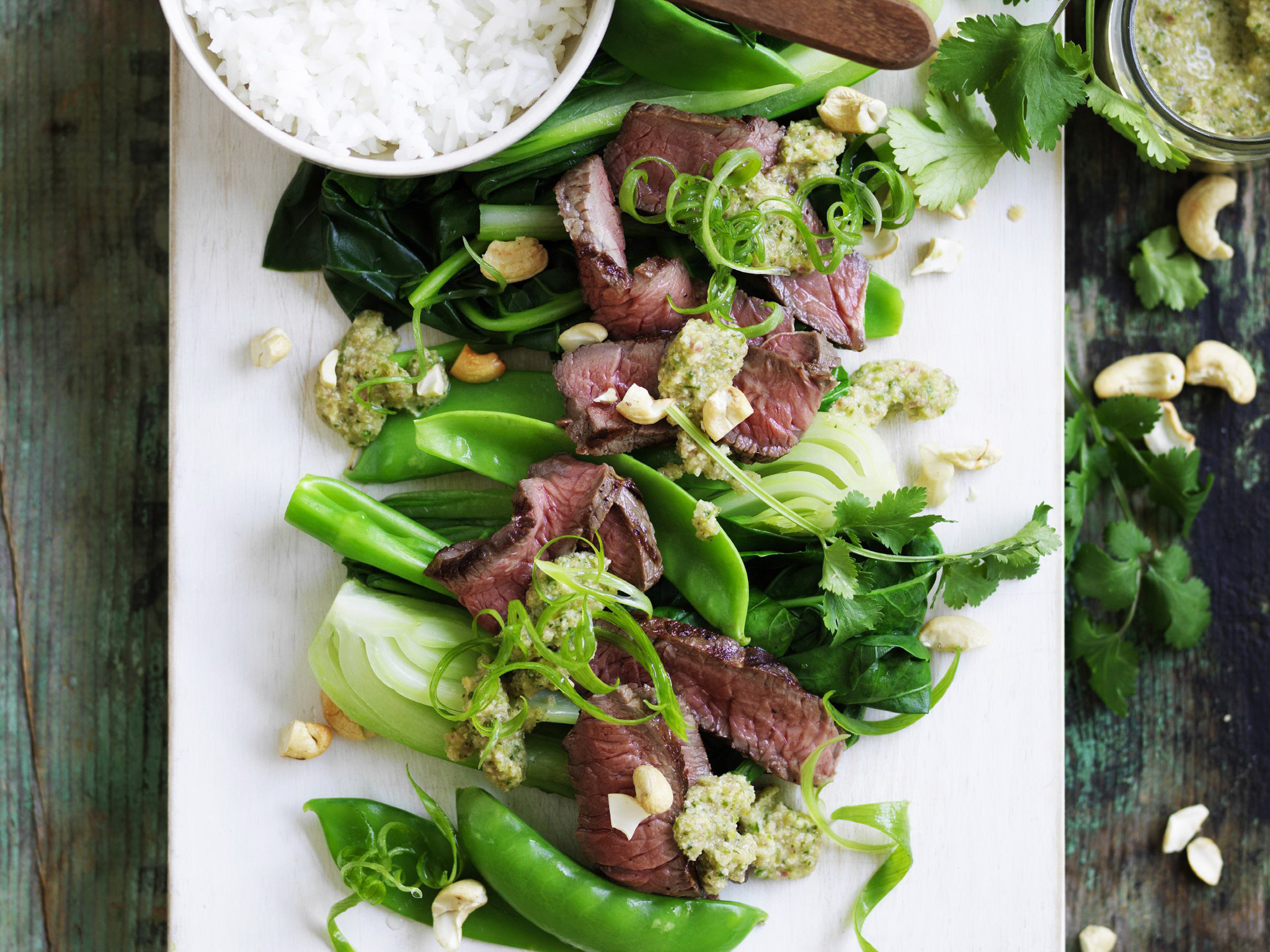 steak with cashew nam jim and asian greens