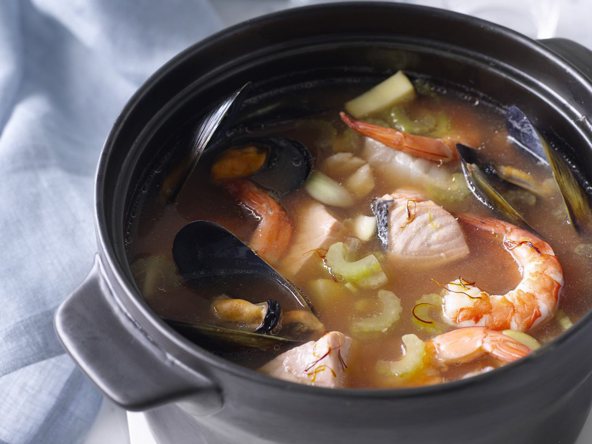Fish stew with saffron, tomato and wine