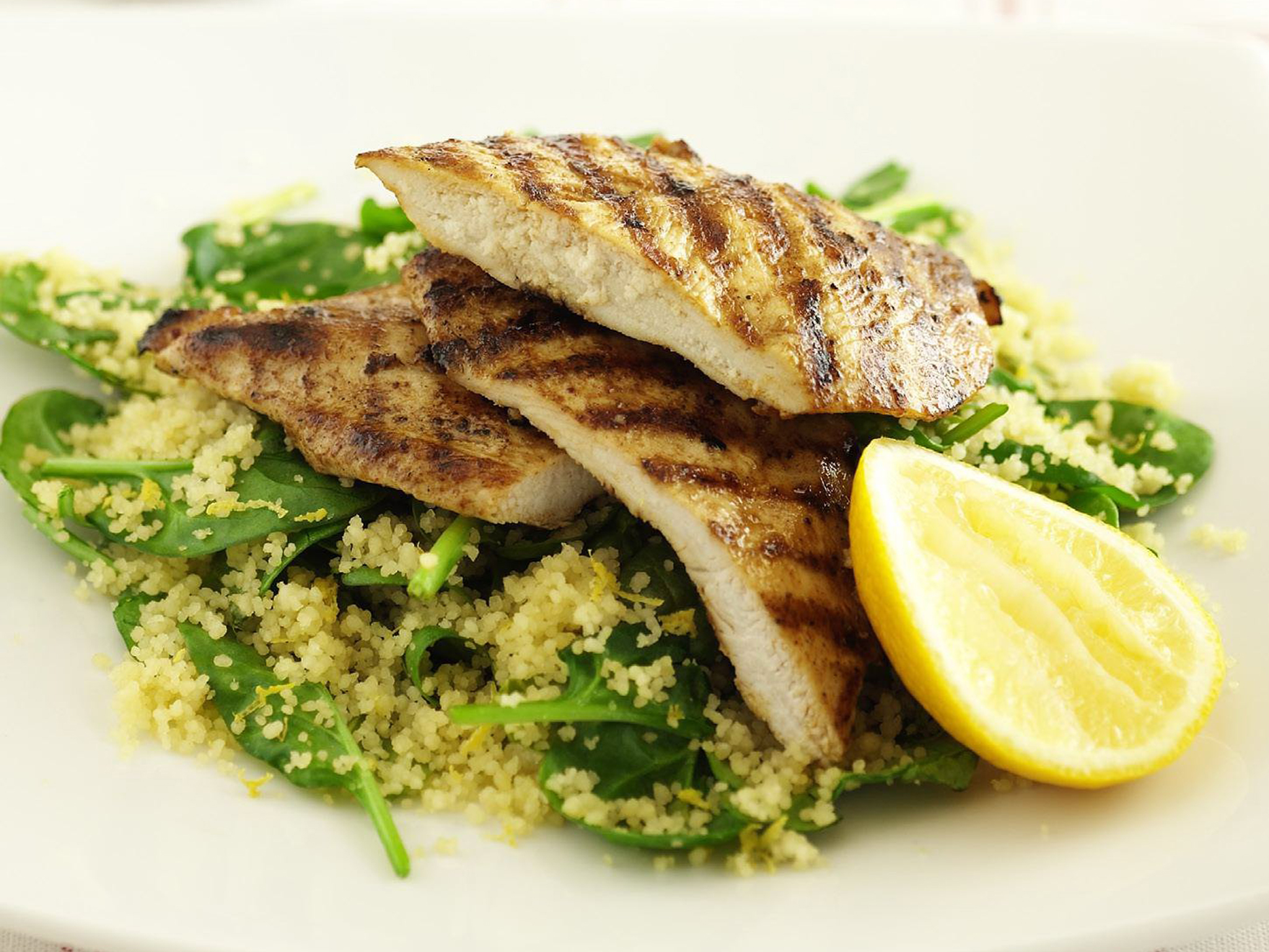 Spicy chicken on couscous with spinach