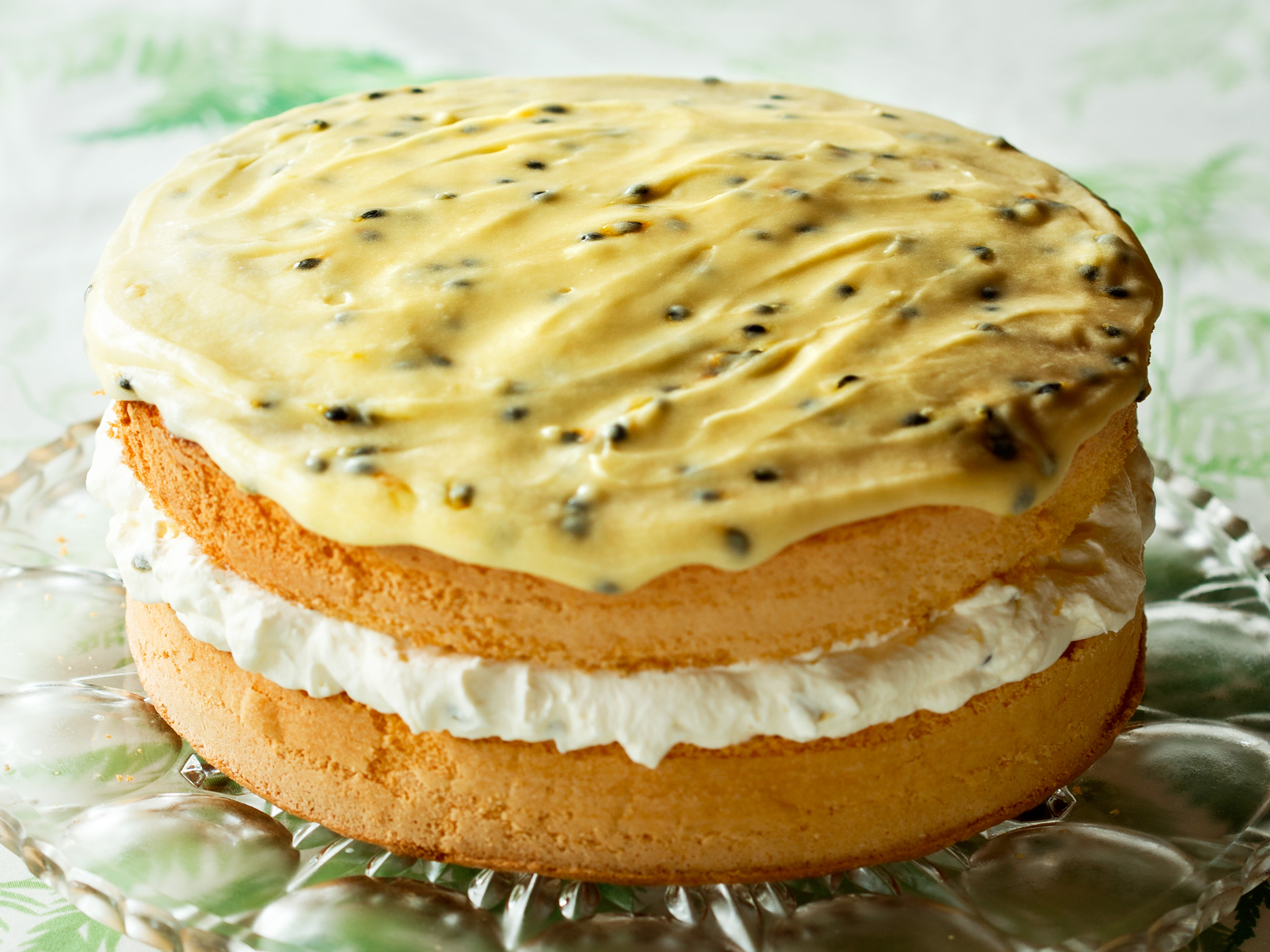 Feather sponge cake with passionfruit icing