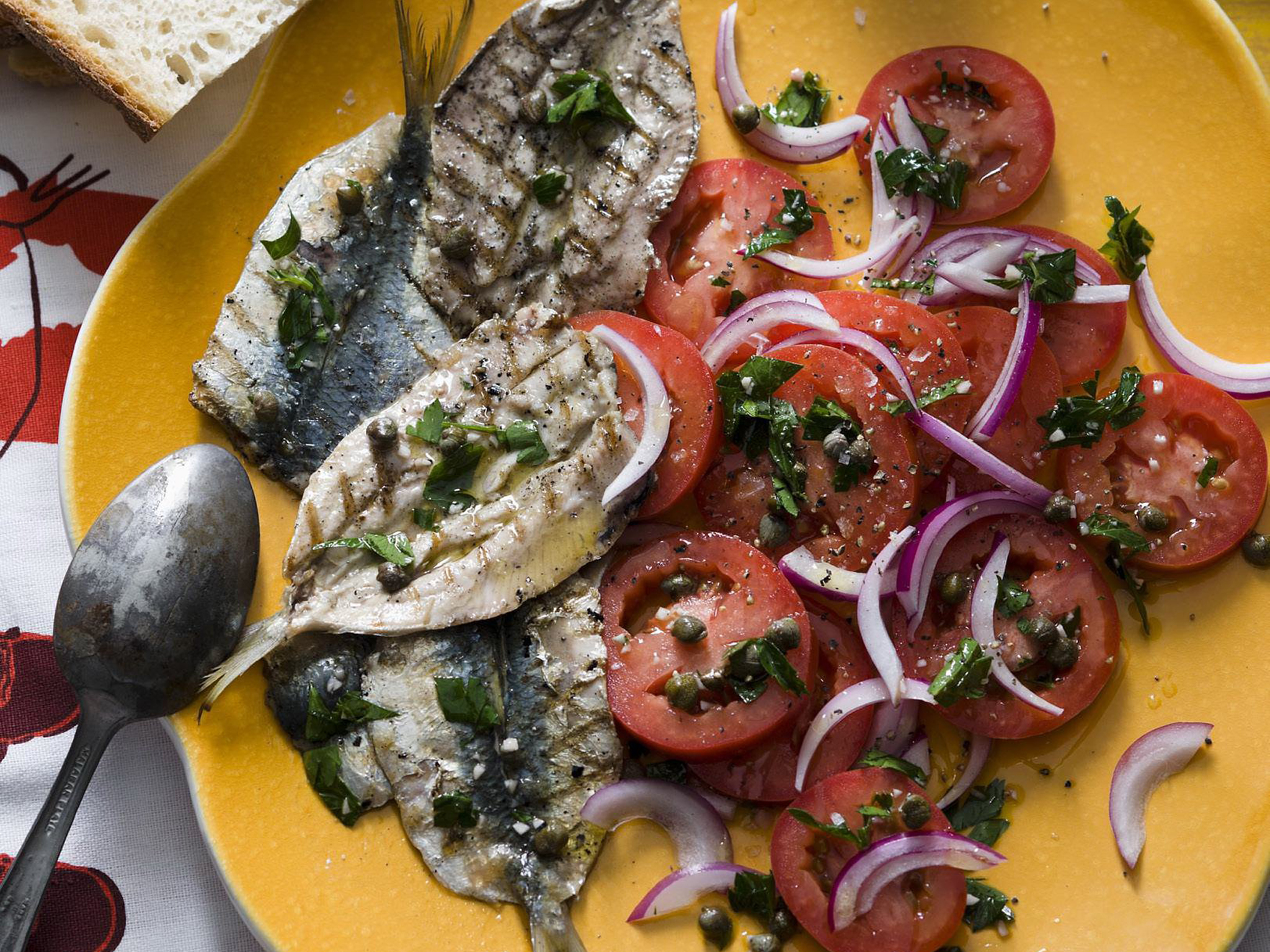 Sardines with tomatoes and caper dressing