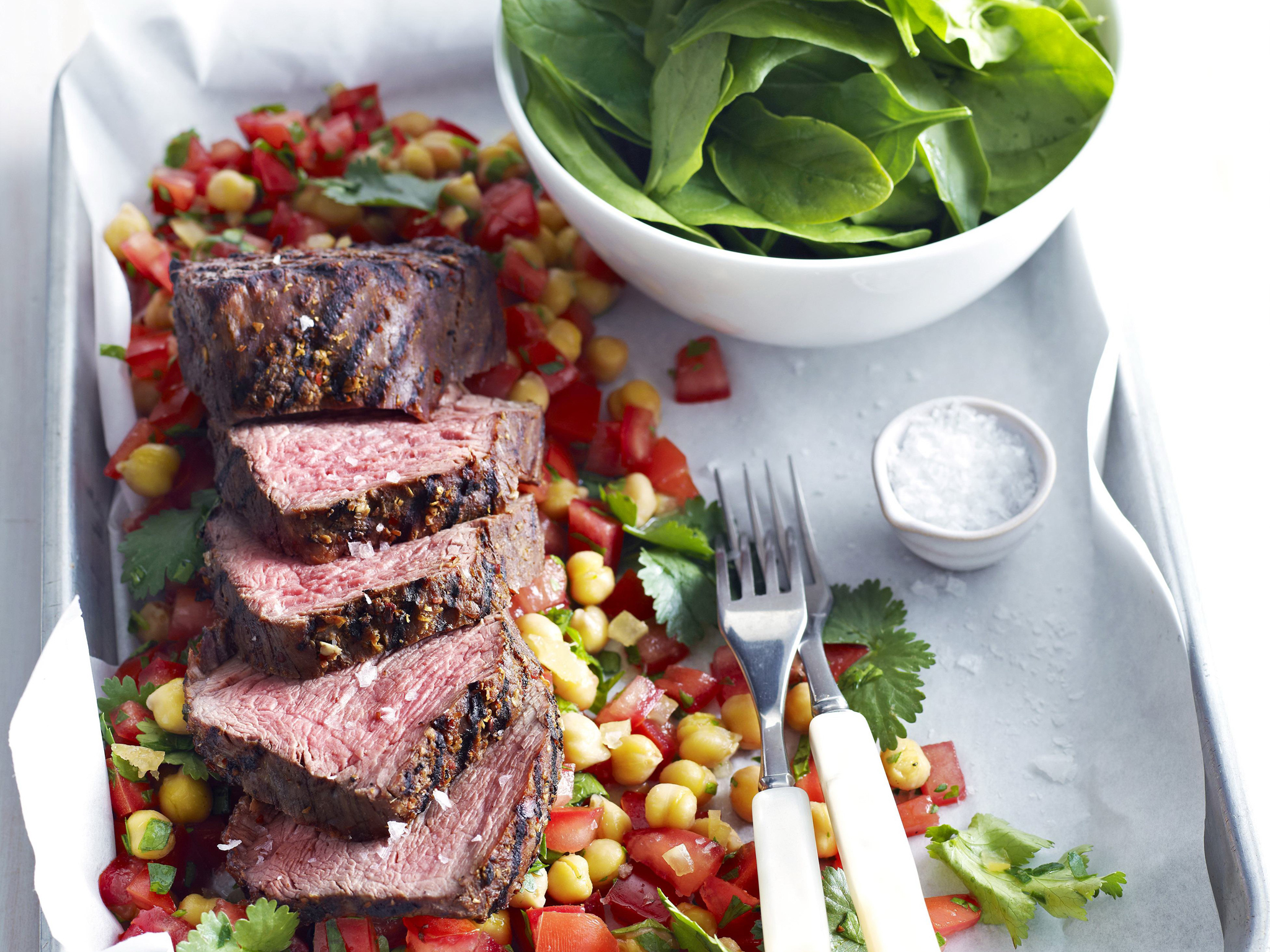Spice-rubbed beef fillet with chickpea and preserved lemon salad