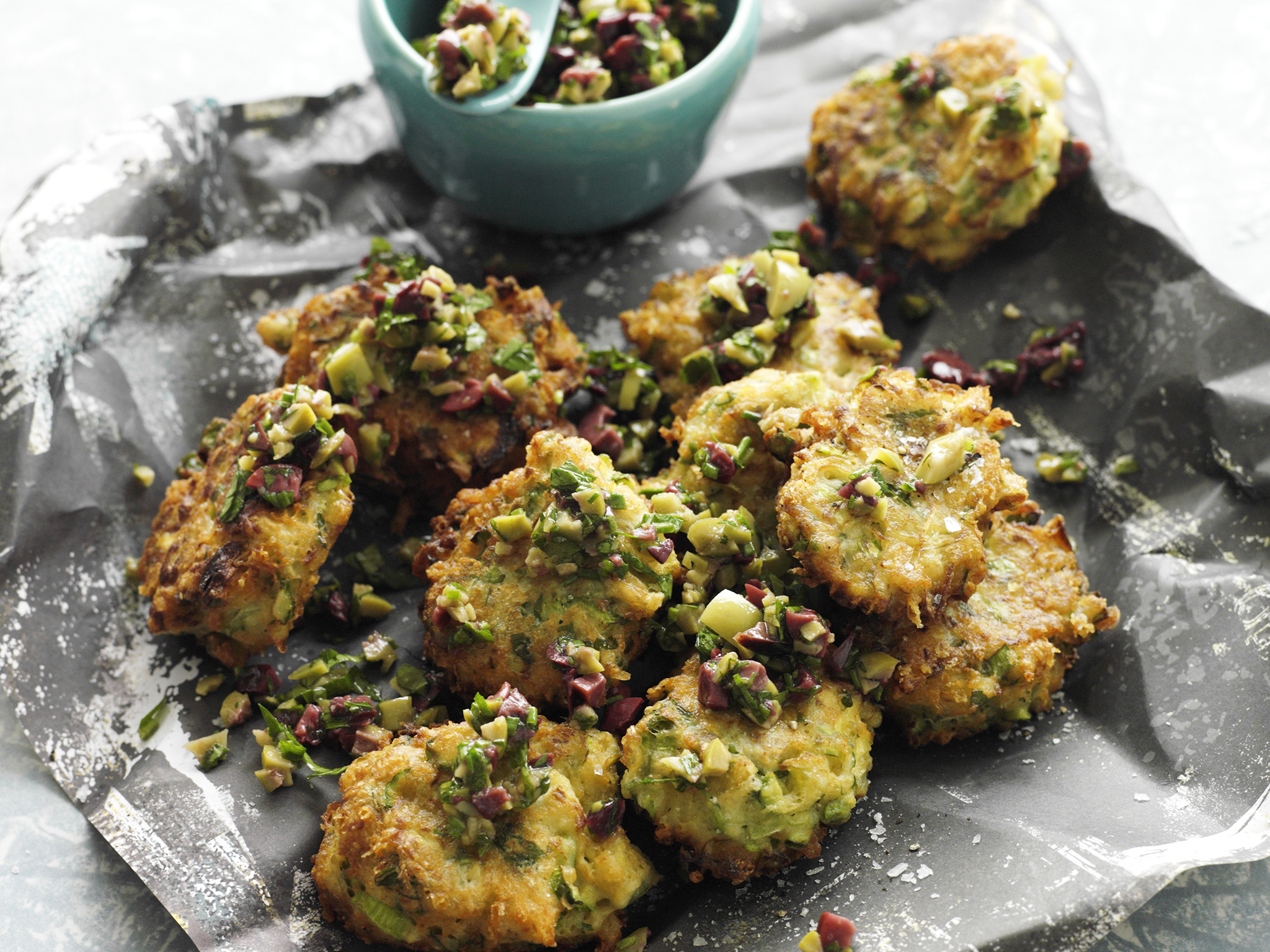 Artichoke and asparagus fritters with olive relish