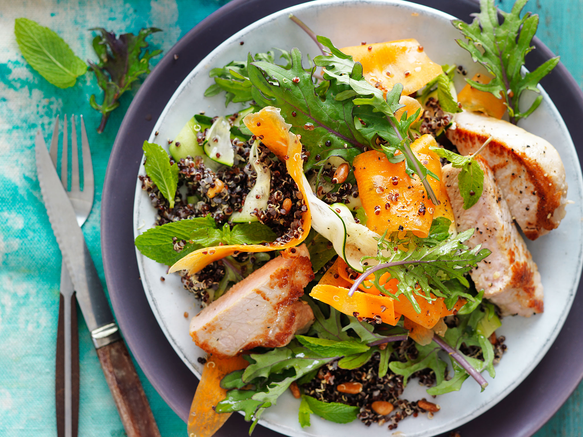 Grilled pork with quinoa and kale salad