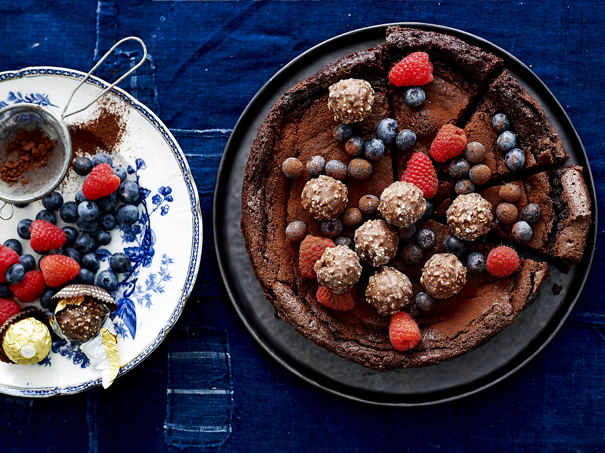 midnight cake topped with berries