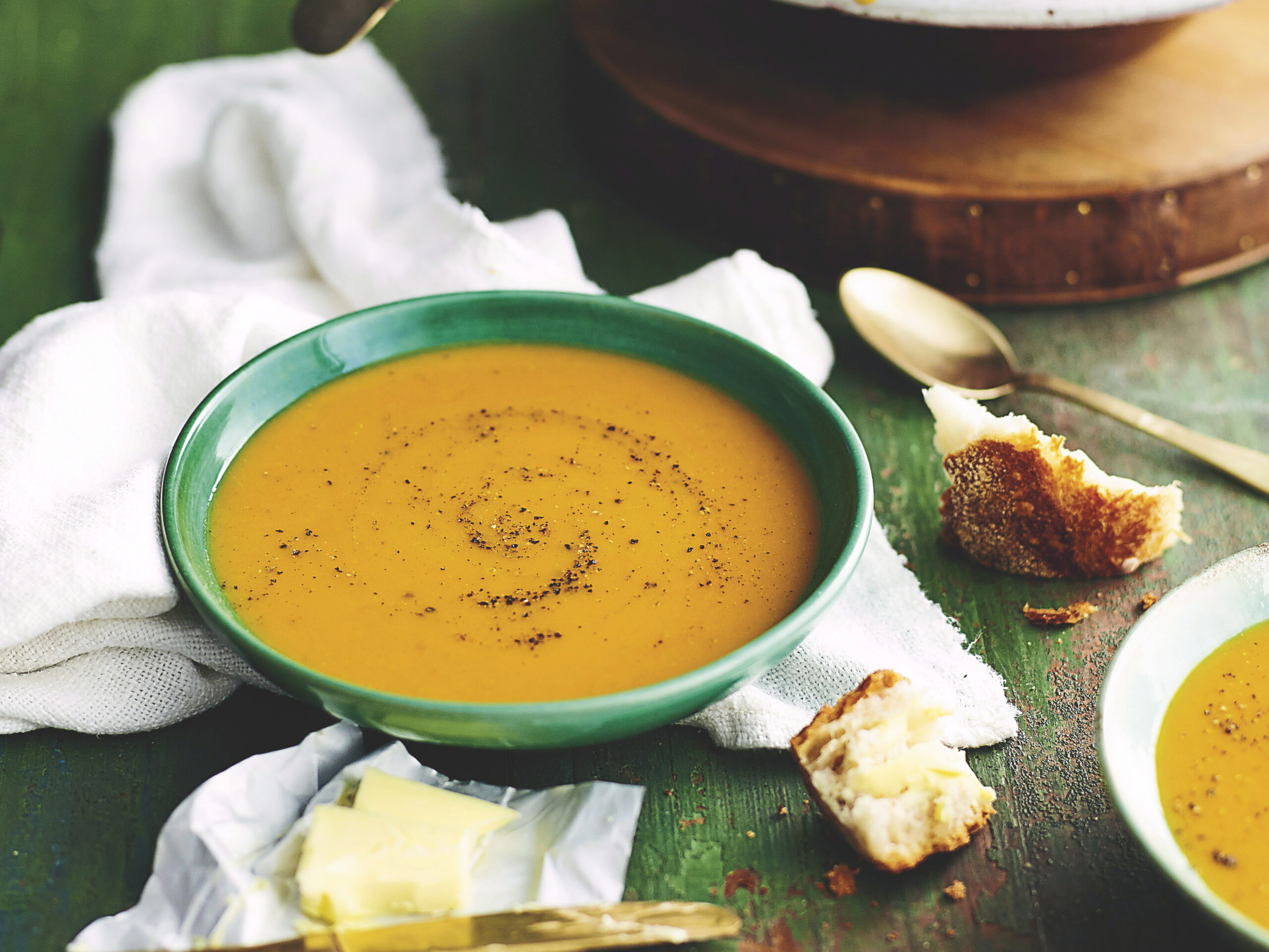 Bowl of pumpkin and potato soup