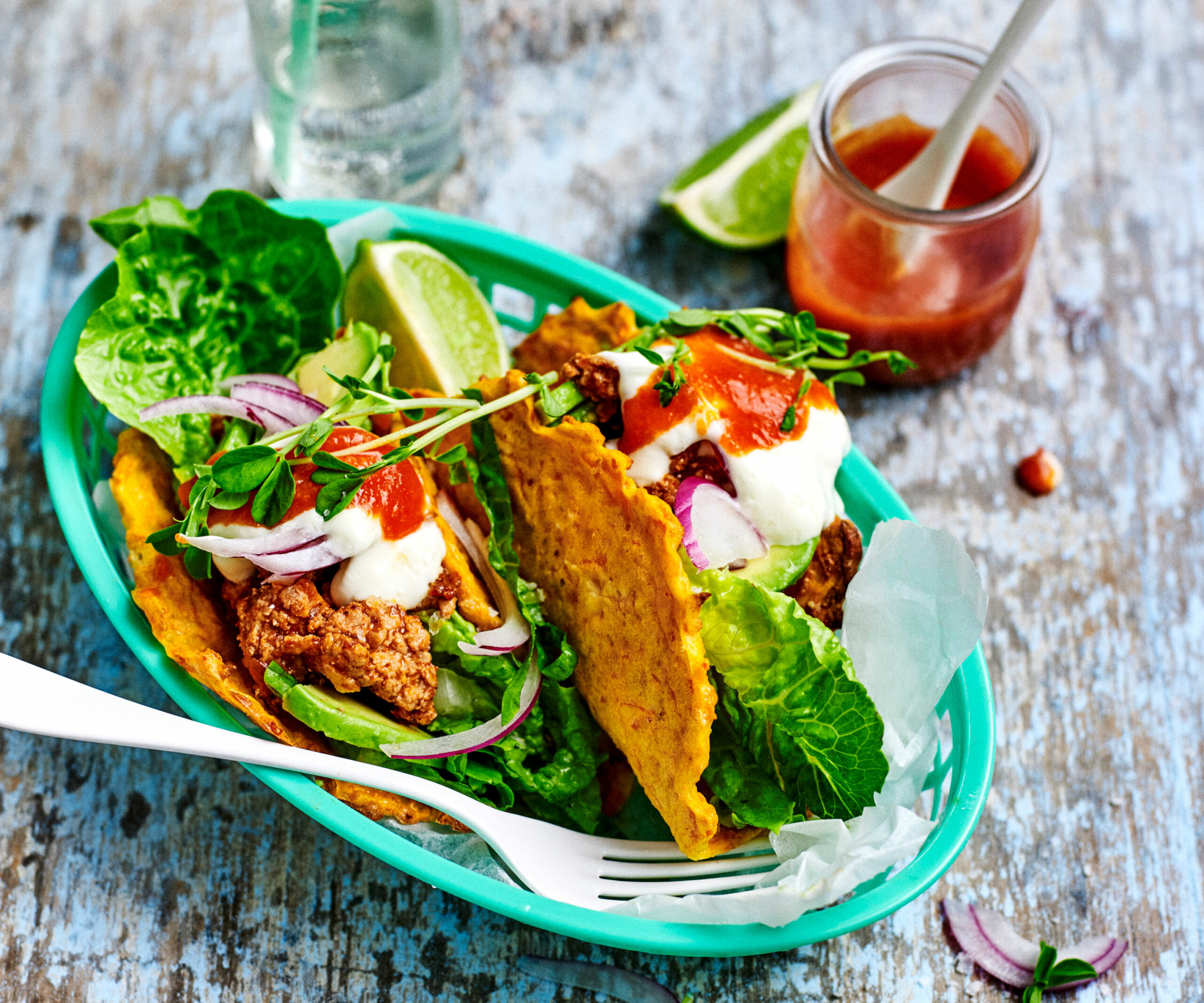 Carrot taco shells with salad and chipotle pork