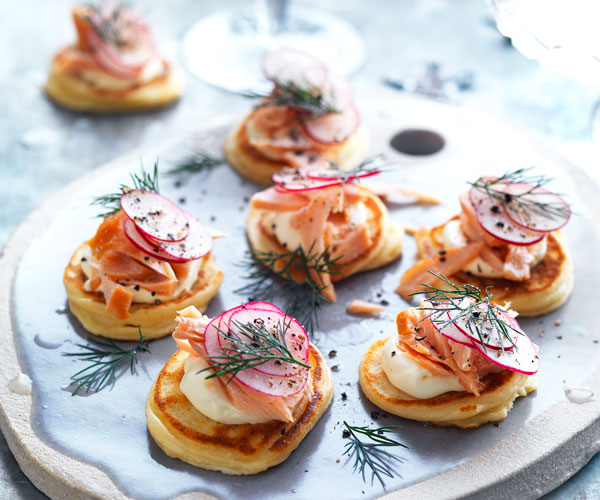 trout blini on a platter