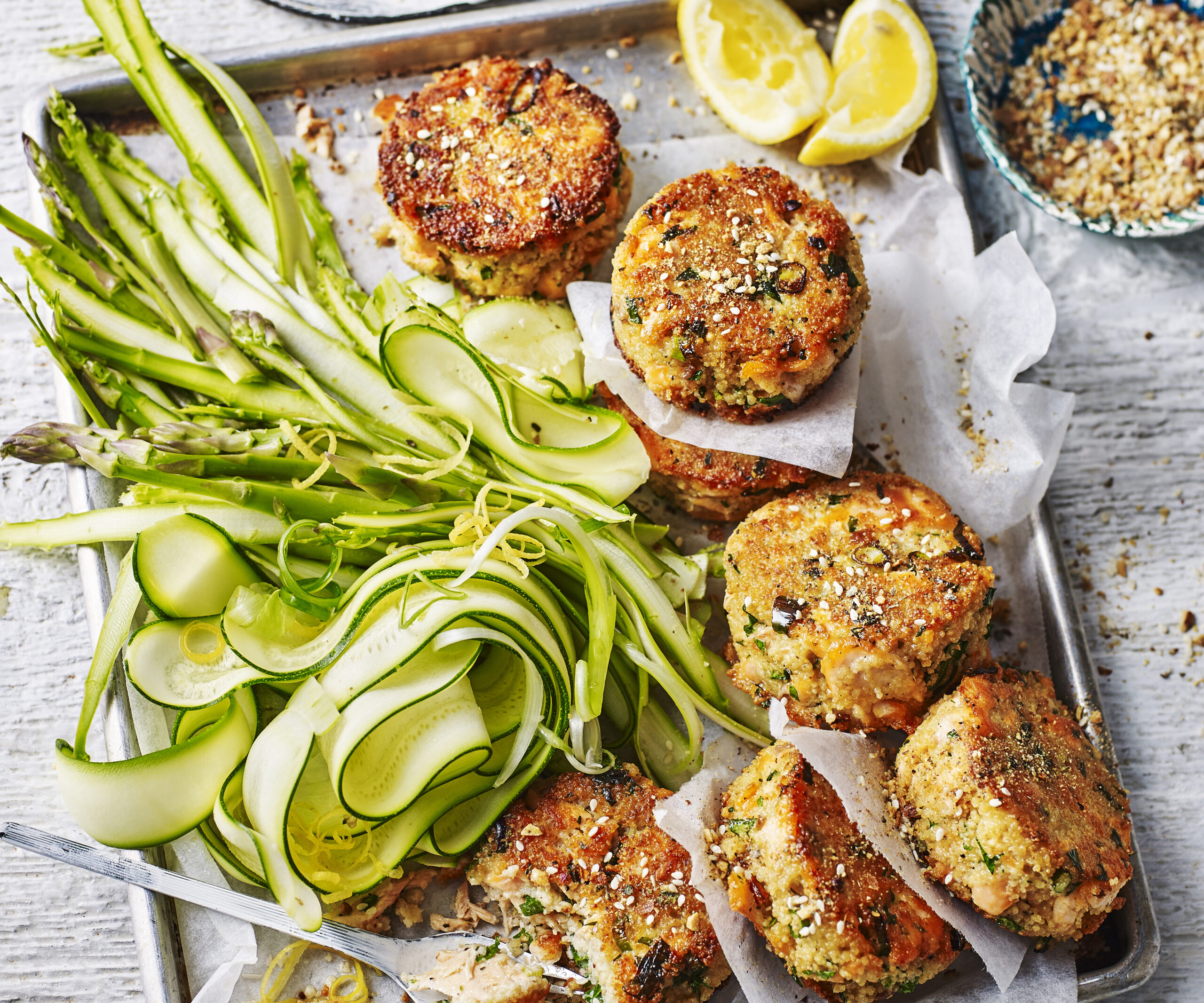 Dukkah salmon patties with zucchini and asparagus salad