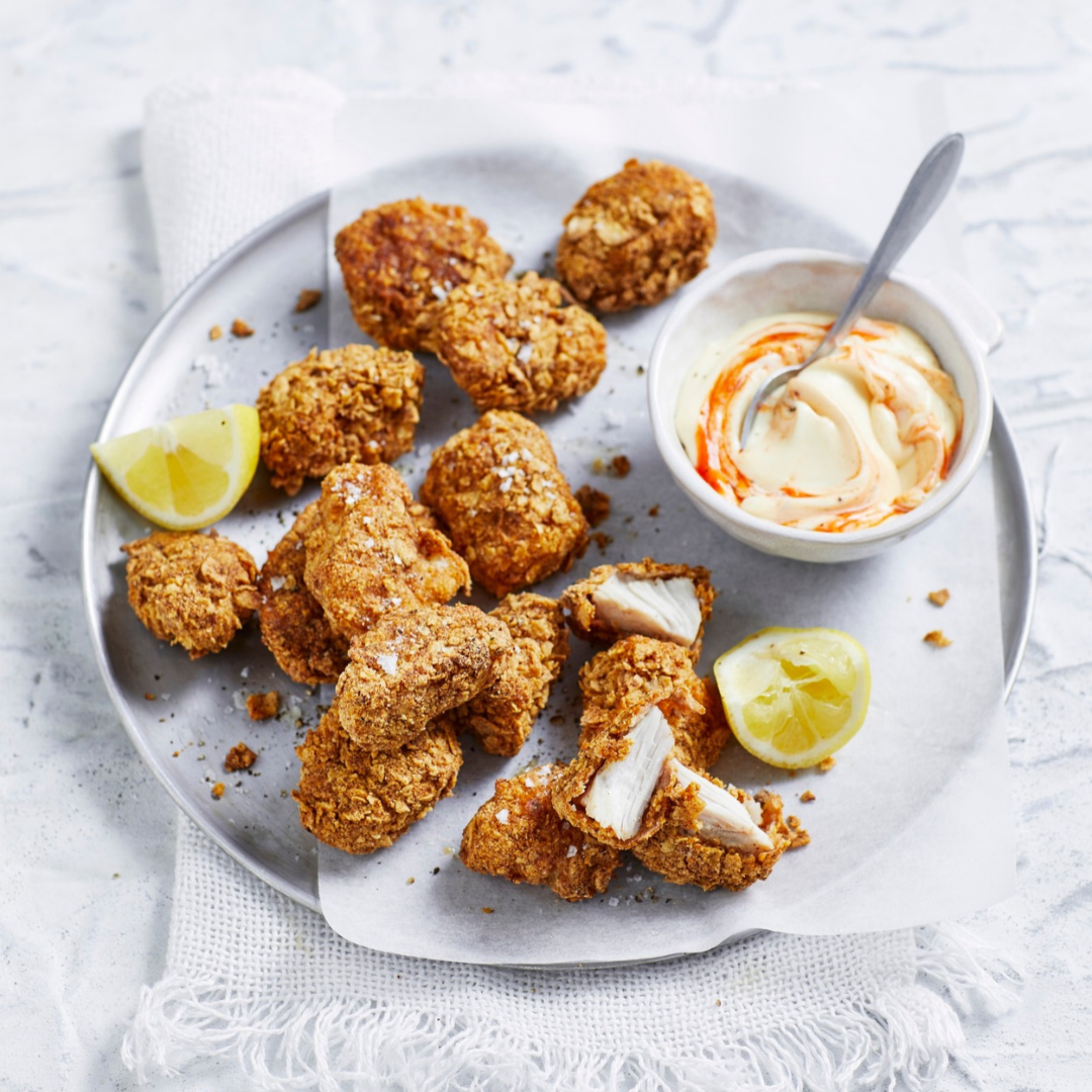 Gluten free chicken nuggets with spicy aïoli dipping sauce