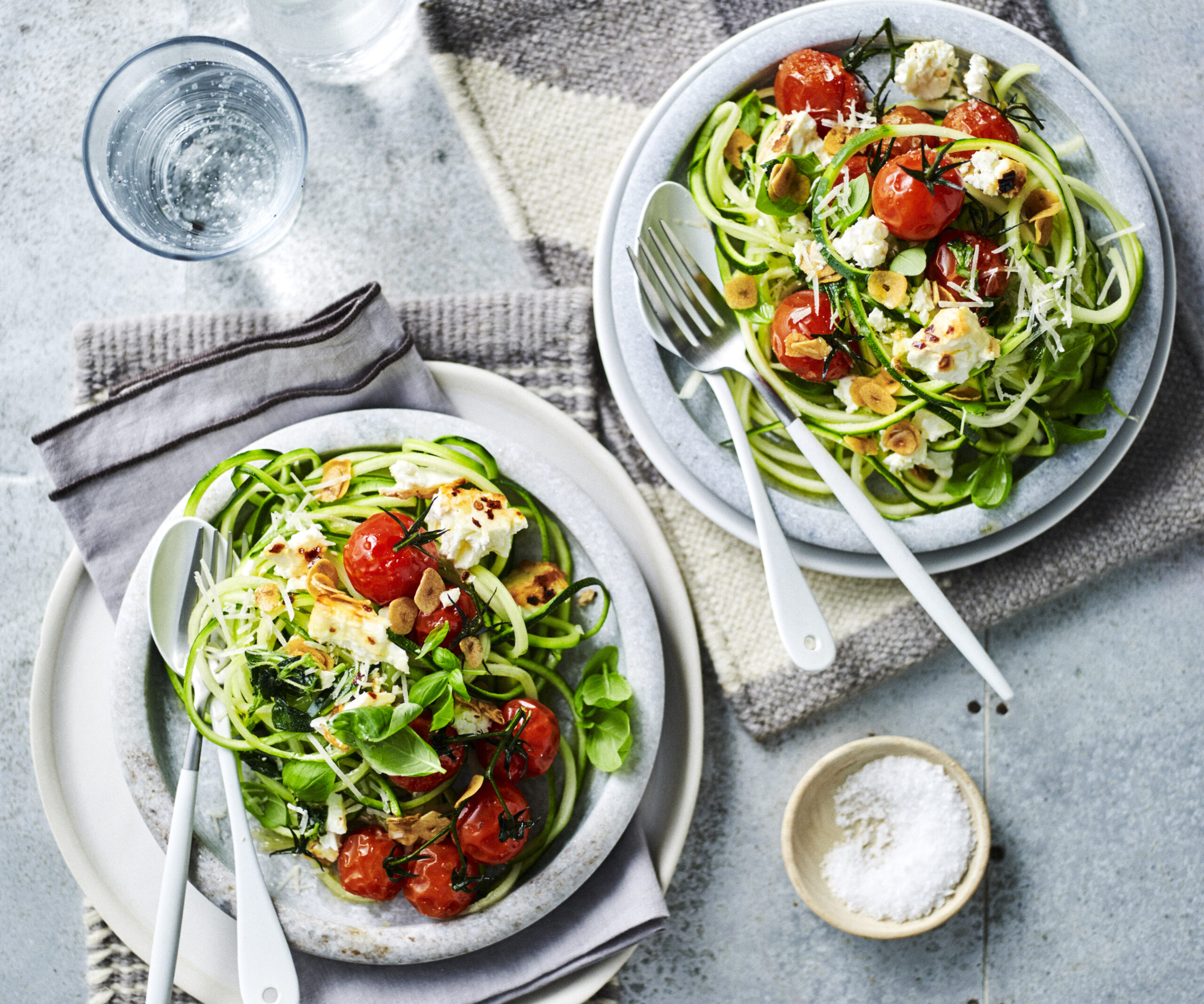 Zucchini ‘spaghetti’ with tomato and fetta-image