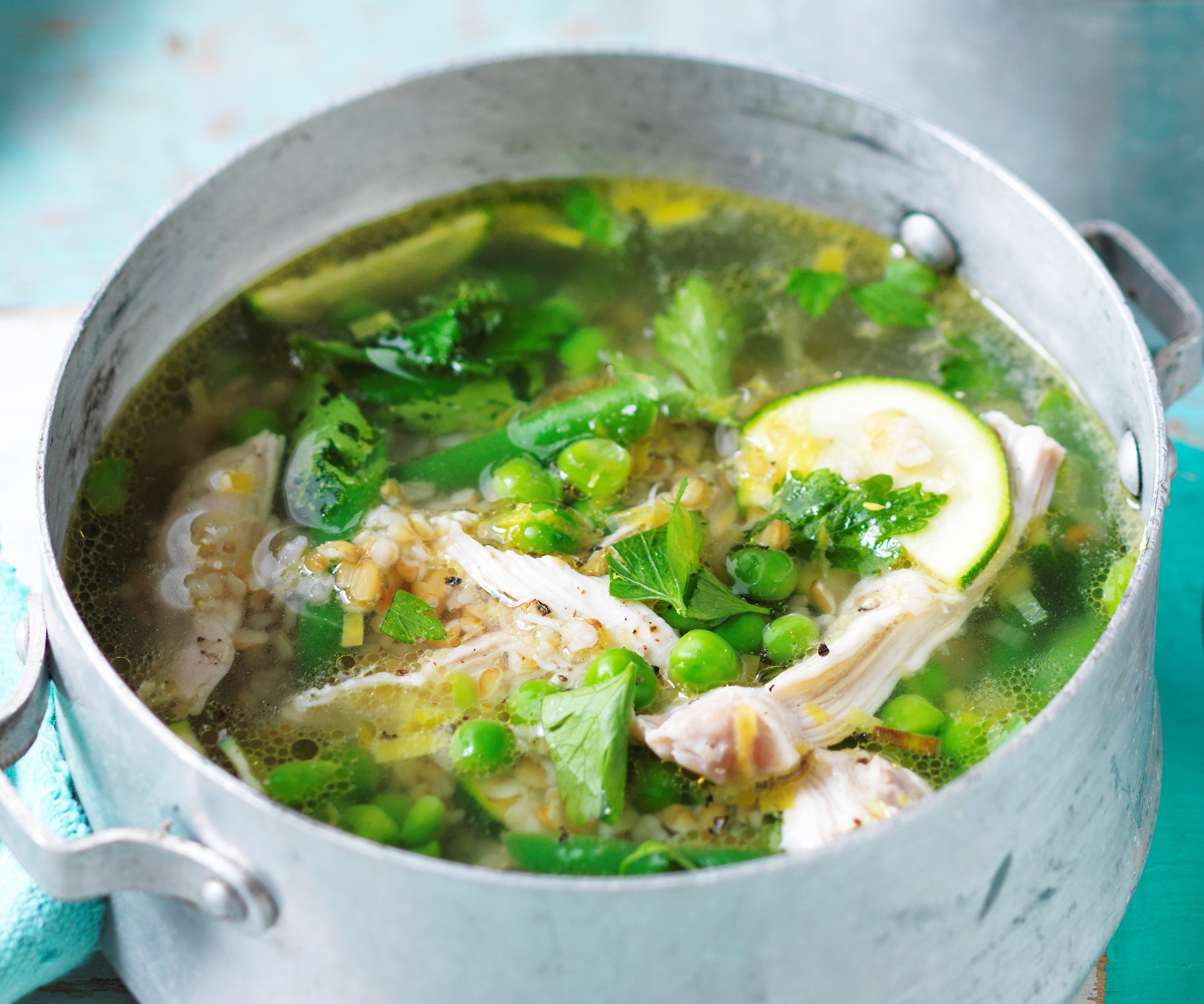 Pot of chicken, zucchini & freekeh soup