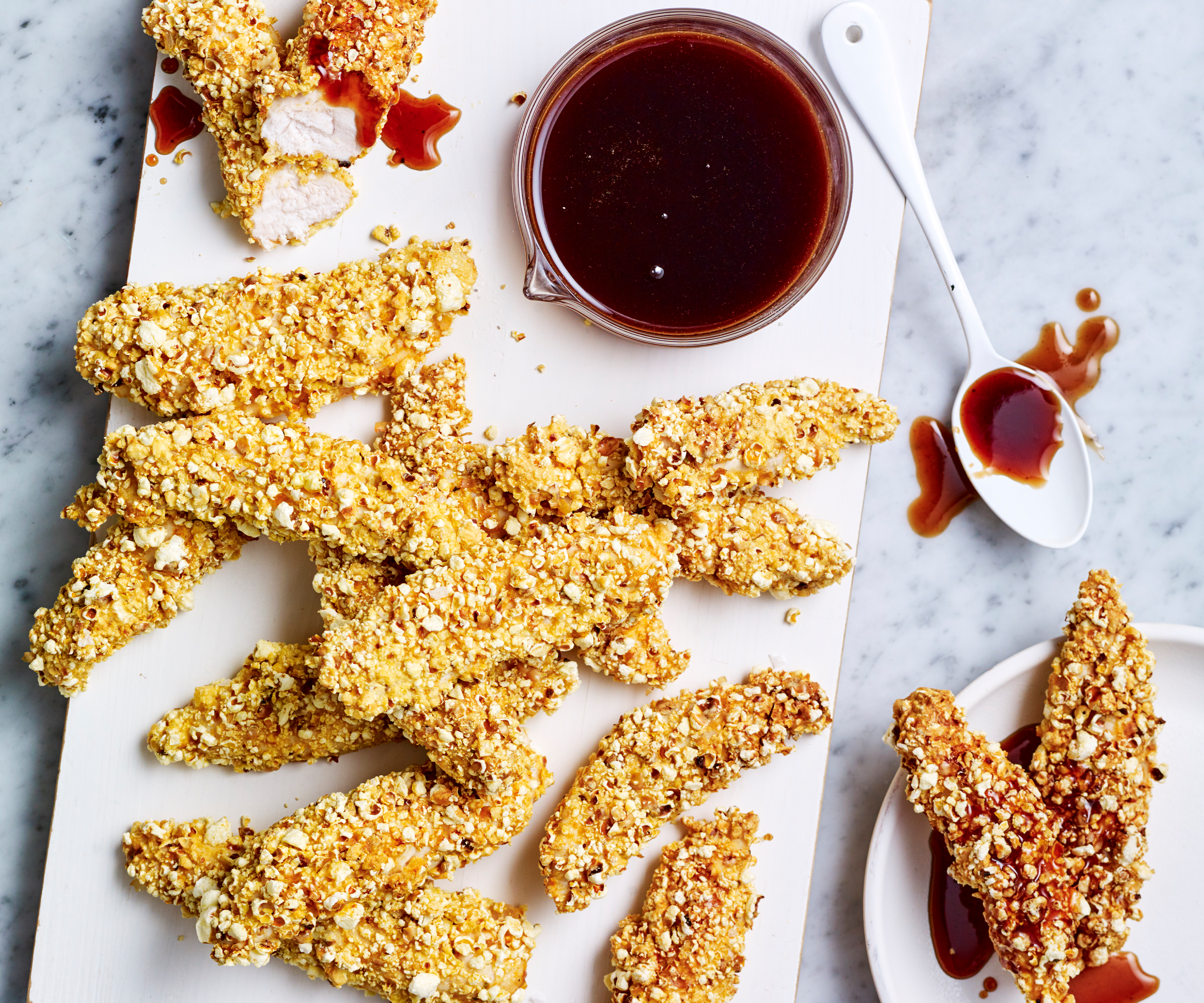Popcorn-coated chicken with honey BBQ sauce