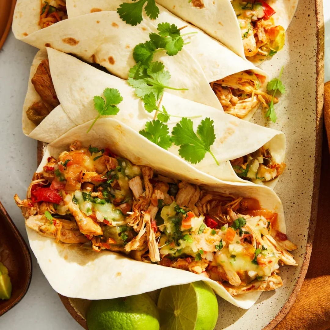 Pulled chicken fajitas with cheesy toppings